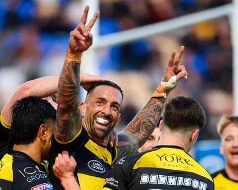 Paul Vaughan celebrates with his York Knights teammates after scoring a try against Toulouse.