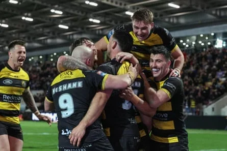 York Knights players celebrate during their 38-14 win against Toulouse